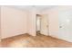 A vacant bedroom with hardwood flooring, ready for customization and new beginnings at 551 Barnes Mill Dr, Marietta, GA 30062