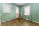 Compact kitchen featuring two windows and a back door at 551 Barnes Mill Dr, Marietta, GA 30062
