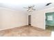 Spacious living room with original hardwood floors and a ceiling fan at 551 Barnes Mill Dr, Marietta, GA 30062
