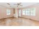 Bright living room with hardwood floors, built in shelving, and natural light at 551 Barnes Mill Dr, Marietta, GA 30062