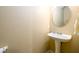 Bathroom with a pedestal sink and a neutral color scheme at 559 Woodland Park Ter, Lawrenceville, GA 30043