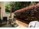 Cozy patio space perfect for outdoor dining and lounging amidst lush greenery at 559 Woodland Park Ter, Lawrenceville, GA 30043