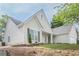 Attractive stucco home boasting professional landscaping and a side-entry garage at 861 Soaring Dr, Marietta, GA 30062
