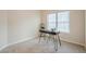 Cozy home office featuring carpeted floors, a large window, and neutral wall colors at 861 Soaring Dr, Marietta, GA 30062