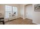 Bright kitchen nook with a coffee bar next to the entry door and large window at 861 Soaring Dr, Marietta, GA 30062