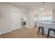 Kitchen with granite countertops, stainless appliances, bar seating and easy access to living room at 861 Soaring Dr, Marietta, GA 30062