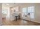 Modern kitchen with white cabinets, breakfast bar, stainless appliances, and convenient coffee station at 861 Soaring Dr, Marietta, GA 30062