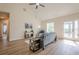 Open living room featuring a vaulted ceiling, luxury vinyl flooring, and backyard access at 861 Soaring Dr, Marietta, GA 30062