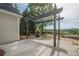 Covered outdoor kitchen area with built-in barbeque and seating perfect for entertaining at 861 Soaring Dr, Marietta, GA 30062