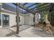 Covered outdoor kitchen area with built-in barbeque and seating located off patio area at 861 Soaring Dr, Marietta, GA 30062