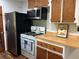 Functional kitchen featuring stainless steel appliances and ample counter space at 877 Verona Dr, Clarkston, GA 30021