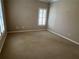 Neutral bedroom with carpet, and a window with shutters at 962 Manor Parc Dr, Decatur, GA 30033