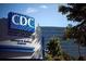 Sign of the CDC campus with the facility's building in the background at 962 Manor Parc Dr, Decatur, GA 30033