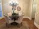 Charming dining room showcasing hardwood floors, a round table, and a stylish chandelier at 962 Manor Parc Dr, Decatur, GA 30033
