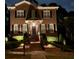 Charming two-story brick home with manicured landscaping and inviting front entrance at 962 Manor Parc Dr, Decatur, GA 30033