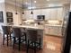 Stylish kitchen with granite countertops, white cabinets and stainless steel appliances at 962 Manor Parc Dr, Decatur, GA 30033