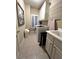 Functional laundry room featuring a washer, dryer, storage cabinets, and a sink at 962 Manor Parc Dr, Decatur, GA 30033