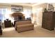 Comfortable main bedroom featuring neutral tones and luxurious bedding at 962 Manor Parc Dr, Decatur, GA 30033