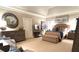 Spacious main bedroom featuring elegant decor and comfortable seating area at 962 Manor Parc Dr, Decatur, GA 30033
