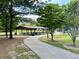 Picturesque picnic area with shaded pavilion, tables, and paved walkway, great for outdoor gatherings at 962 Manor Parc Dr, Decatur, GA 30033