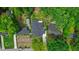 Aerial view of the property showcasing the home, surrounding greenery, and neighborhood at 1826 Terry Mill Se Rd, Atlanta, GA 30316