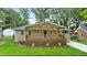 Charming bungalow with covered front porch, inviting curb appeal, and landscaped yard at 1826 Terry Mill Se Rd, Atlanta, GA 30316
