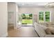 Living room view with sliding doors to the backyard and neutral-colored walls at 1826 Terry Mill Se Rd, Atlanta, GA 30316
