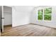 Bedroom featuring closet and large window for natural light at 2263 Barge Rd, Atlanta, GA 30331
