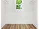 Walk-in closet with built-in shelving and natural light at 2263 Barge Rd, Atlanta, GA 30331