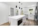 Clean kitchen with a large island, stainless steel appliances, and lots of natural light at 2263 Barge Rd, Atlanta, GA 30331