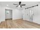 Large main bedroom with sliding barn door to closet and bathroom at 2263 Barge Rd, Atlanta, GA 30331