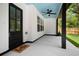 Covered back patio with ceiling fan and a view of the backyard at 2263 Barge Rd, Atlanta, GA 30331