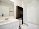This bathroom features a white vanity and toilet along with a shower over tub at 2804 Torunn Ct, Atlanta, GA 30331