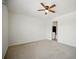 This bedroom features neutral carpet and a ceiling fan with integrated lighting at 2804 Torunn Ct, Atlanta, GA 30331