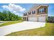 Attractive two-story home featuring a brick facade and a spacious driveway on a sunny day at 2804 Torunn Ct, Atlanta, GA 30331