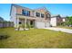 Well-manicured lawn and charming exterior of a two-story brick home with a two car garage at 2804 Torunn Ct, Atlanta, GA 30331