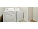 Convenient laundry room features a new washer and dryer set with easy hookups at 2804 Torunn Ct, Atlanta, GA 30331