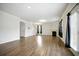 Open living area featuring hardwood flooring, a fireplace and a sliding door to the exterior at 2804 Torunn Ct, Atlanta, GA 30331
