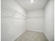 Walk-in closet featuring carpeted floor and wire shelving at 2804 Torunn Ct, Atlanta, GA 30331