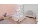 A decorated bedroom with pink accents and a crib at 3360 Meadow Grass Dr, Dacula, GA 30019
