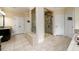 Spacious bathroom featuring a large shower, double closets, and vanity with granite counters at 6110 Read Rd, Suwanee, GA 30024
