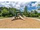 Community playground area with slides, perfect for outdoor fun at 6110 Read Rd, Suwanee, GA 30024