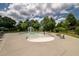 A fun splash pad featuring a waterfall and seating for relaxation and play at 6110 Read Rd, Suwanee, GA 30024