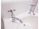 Close-up of the sink featuring traditional-style faucet fixtures and hardware at 23 Clifton Se St, Atlanta, GA 30317