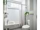 Charming bathroom featuring classic black and white tile and traditional fixtures at 23 Clifton Se St, Atlanta, GA 30317
