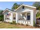 Charming bungalow duplex with inviting front porches and American flag at 23 Clifton Se St, Atlanta, GA 30317