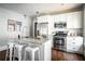 Modern kitchen featuring granite countertops, stainless steel appliances, and island seating at 23 Clifton Se St, Atlanta, GA 30317