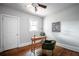Well-lit home office featuring stylish décor, wooden desk and modern artwork at 23 Clifton Se St, Atlanta, GA 30317