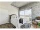 Bedroom featuring a large window view, rug, and decorative pillows at 361 17Th Nw St # 1603, Atlanta, GA 30363