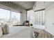 Comfortable bedroom with city views and sliding doors to a balcony at 361 17Th Nw St # 1603, Atlanta, GA 30363